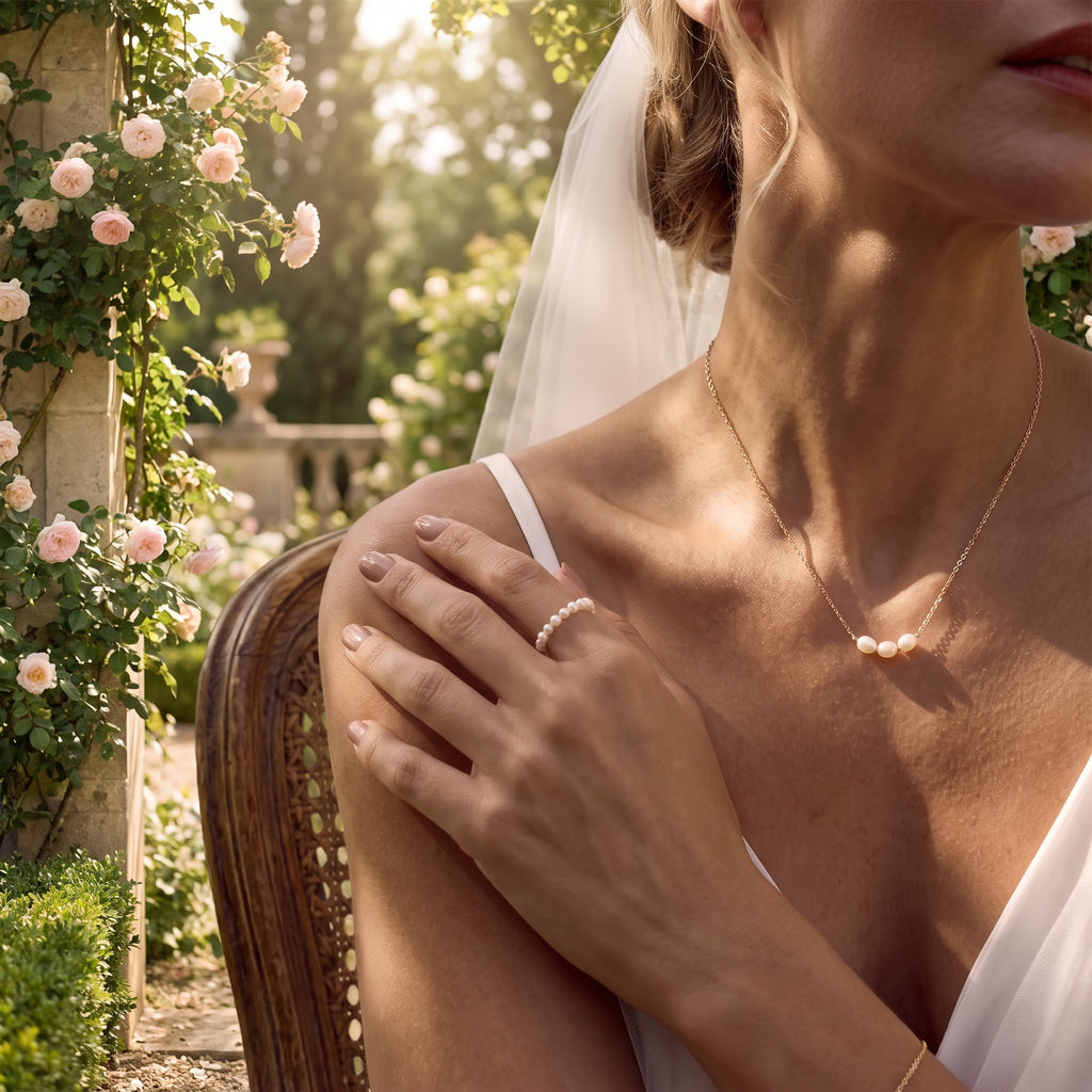 Gold plated necklace with three white pearls